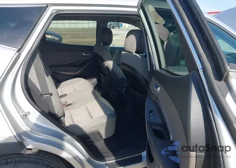 2014 Hyundai Santa Fe Sport 2.4L z USA, uszkodzony, nr VIN 5XYZUDLB3EG220704